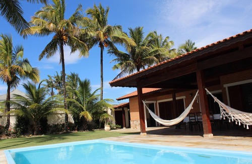 Parque Oasis House | Located 30 meters from the beach, this property features 8 bedrooms, including 5 suites, and a swimming pool.