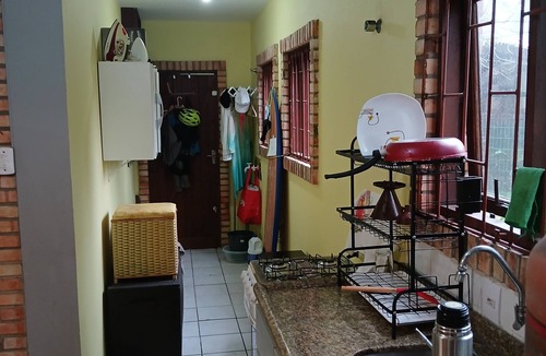 Rio Tavares Ski Chalet | Located 300 meters from the beach, the house faces east and is surrounded by grass.