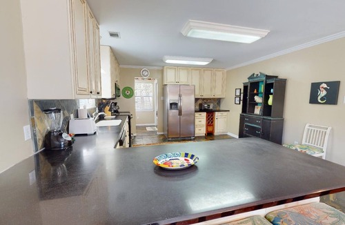 Savannah Beach House | Located Just One Block From Beach w/Spacious Porch