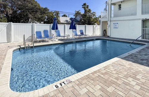 Pass-a-Grille Historic District Condo | Located on Historic Pass-A-Grille Beach. Steps to Sand, Heated Pool, Near Food and Free Parking!