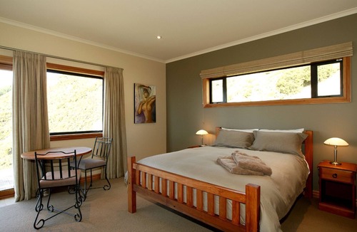 Todds Valley Cabin | Lodge Suite with Deck Overlooking the Beautiful Tasman Bay in New Zealand