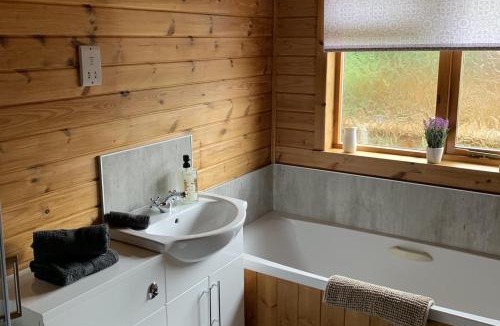Hawick House | Lodge with river view - sleeps 6 - pet friendly