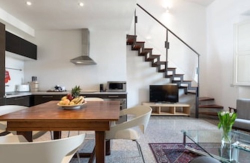Lungarno del Tempio Apartment | Loft with panoramic terrace over Florence rooftops