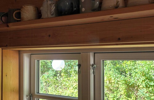 Tim House | Log cabin between North Sea and Stadil Fjord