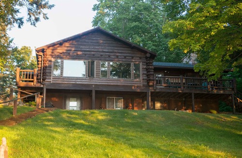 Winter Cabin | Log cabin on beautiful clear lake perfect for your family retreat.