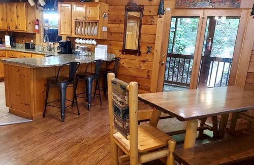 Pigeon Forge Cabin | Log Cabin Sleeps Nine-Convenient to Attractions-Easy Access- Private Hot Tub