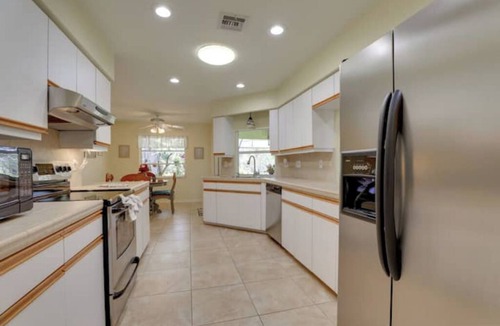 Deep Creek House | Long-term discount! Spacious 3BR Home With Tropical Garden & Koi Pond in Lanai