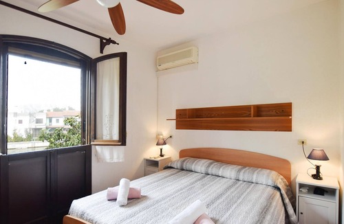 Isola Albarella House | Look forward to a cozy townhouse equipped with everything you may need for a vacation in Italy.