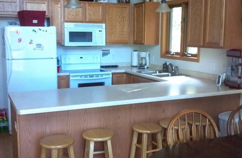 St Germain House | Loon Call Lodge, Lake Home 3-bedroom 2 bath, 3 levels of living space. Sleeps 13