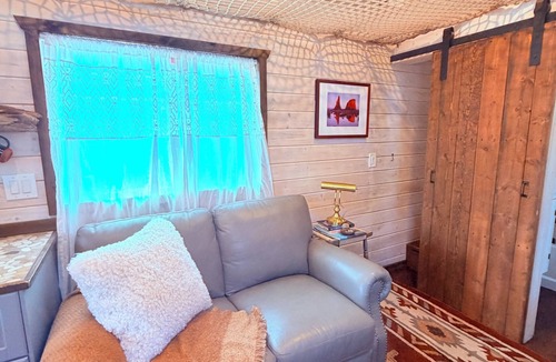Moab South Valley House | Lovely 2-bedroom tiny home on wheels with AC in Moab