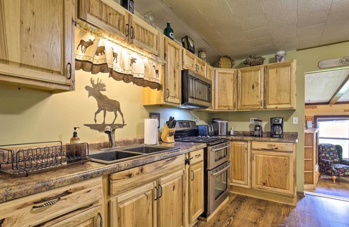 Eagle River Cottage | Lovely Lakefront Cottage w/ Fire Pit & Yard!