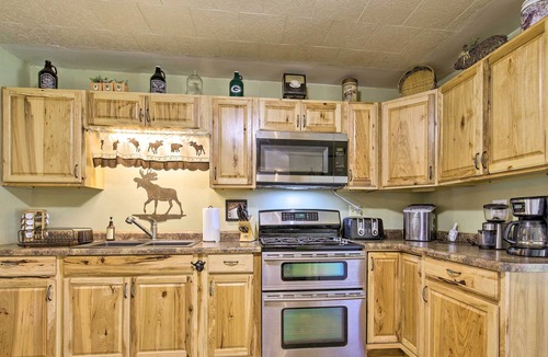 Eagle River Cottage | Lovely Lakefront Cottage w/ Fire Pit & Yard!