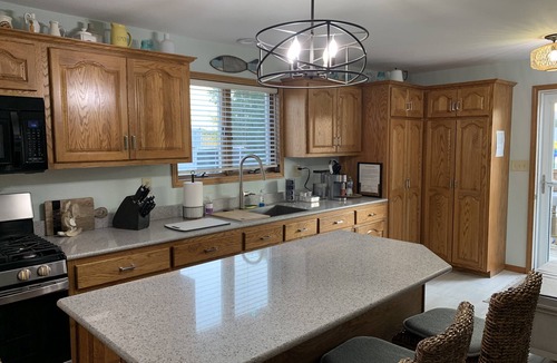 Two Rivers House | Lovely Riverfront views of river. Walking distance to beach. 🚴👙🐠