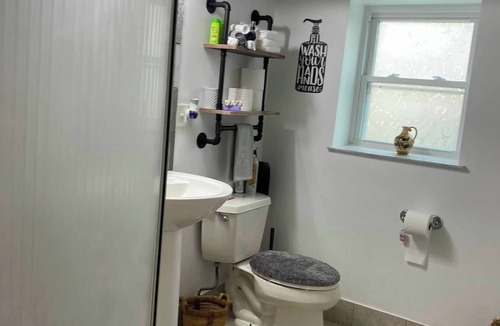 Franklin Park Apartment | Lovely studio at the attic king +full bed in bedroom and futon in kitchen.