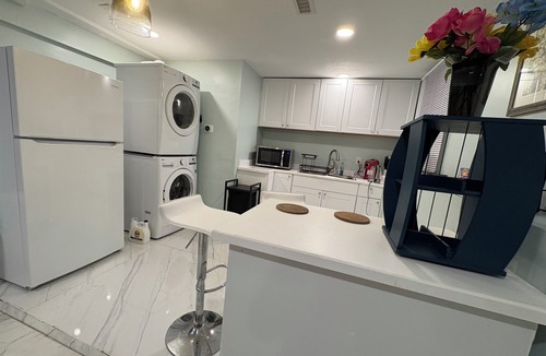Watertown Apartment | Lower-level, a Double bed, shared bath & kitchen