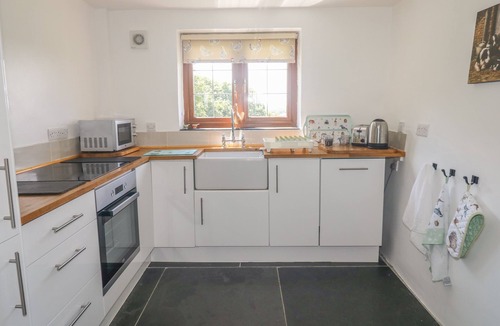 Brazzacott Cottage | LOWER WEST CURRY COTTAGE, pet friendly, with a garden in Launceston