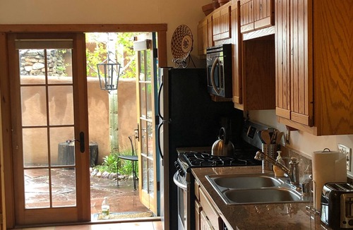 Taos Apartment | Luna Rosa studio at Casa Encantada Taos. Private Hot Tub.