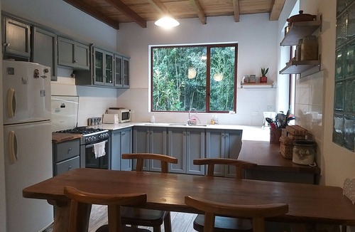 San Miguel de los Bancos House | Lush 5-bdr riverside house in Mindo cloud forest- short walk to charming town