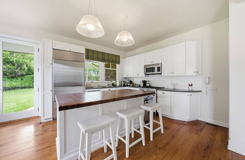Bridgehampton House | Lushly Landscaped, Light and Spacious Family Home with a 65' Pool