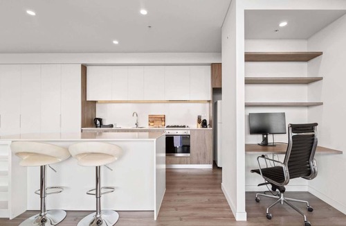 Lidcombe Apartment | Luxe 2-Bed: Modern Interiors, Balcony & BBQ Area