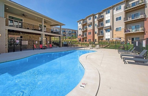 West Des Moines Apartment | Luxe, First Floor Suite with Garage & Balcony