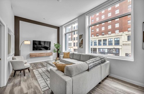 Gateway District Apartment | Luxe Flat with Heated Pool Sauna Rooftop Deck Gym