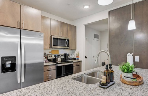 Deerwood Apartment | Luxe Poolside Condo, King Bed, Near Mayo Clinic, St Johns Town Center & Beaches