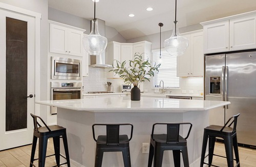Jacksonville Beach House | Luxe retreat w/heated pool+firepit+indoor pickleball wall+gym 5 min to beach