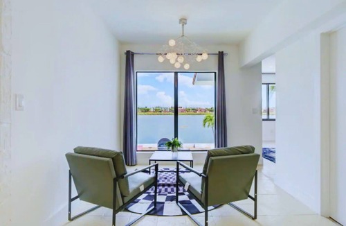 Seybold Villa | Luxe WATERFRONT MANSION w Private Nightclub, Cinema, Game Room & Pool