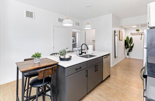 Carag Apartment | Luxurious 2BR Retreat near Downtown Roofdeck & Gym