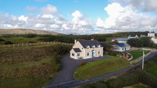 Lettermacaward House | Luxurious 5 bedroomed home with sea view close to beach