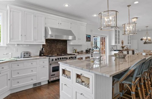 North Sea House | Luxurious 7-bedroom house in Southampton for family summer getaways, Heated Pool