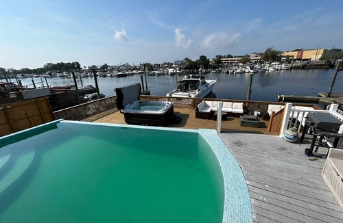 Gerritsen Beach House | Luxurious Amenity Filled Water-Front Home in Family Friendly Neighborhood.