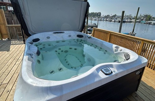 Gerritsen Beach House | Luxurious Amenity Filled Water-Front Home in Family Friendly Neighborhood.