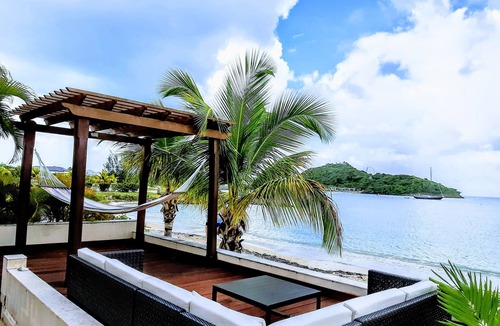 Jolly Harbour House | Luxurious beachfront villa with private pool