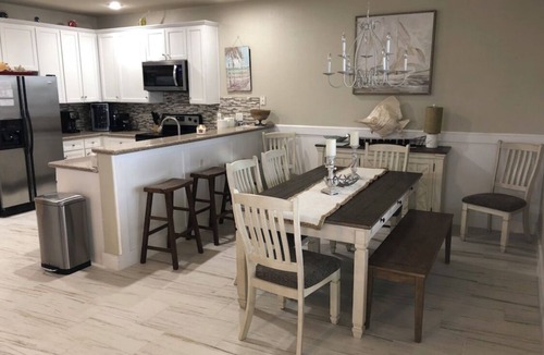 Red Fish Cove Condo | Luxurious beachside condo- steps to beach club