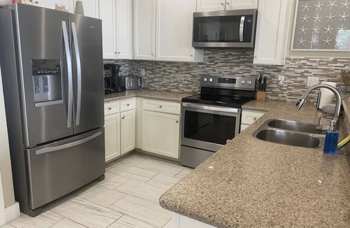 Red Fish Cove Condo | Luxurious beachside condo- steps to beach club