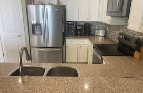 Red Fish Cove Condo | Luxurious beachside condo- steps to beach club