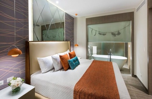 Punta Cana Hotel | Luxurious Flat Suite w/King Bed, Rain Shower, & Round Day Bed ALL-INCLUSIVE