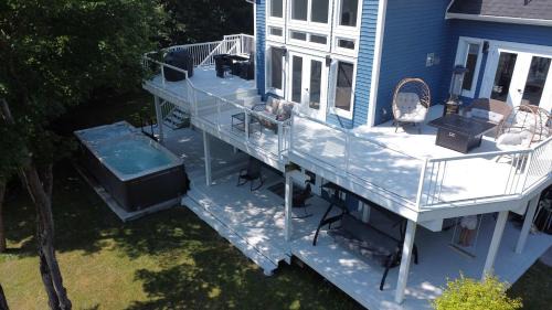 Humber Valley Ski Chalet | Luxurious Lakeside Chalet with Swim Spa