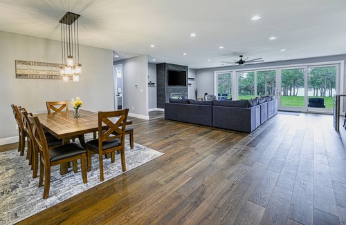 Louisa House | Luxurious lakeside home with private dock, beach, patio, & game room - dogs OK