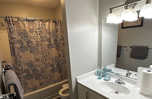 West Bloomington Condo | luxurious retreat w top-notch features, AC, play area, game fun, gym & patio