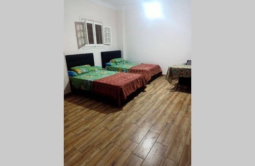 New Cairo Apartment | Luxurious studio with an area of ​​30 meters on the roof of the villa on the third floor with the privacy of the roof for the tenant with a charming view of the gardens in the best place in the Fifth Settlement, steps away from the best malls, cafes