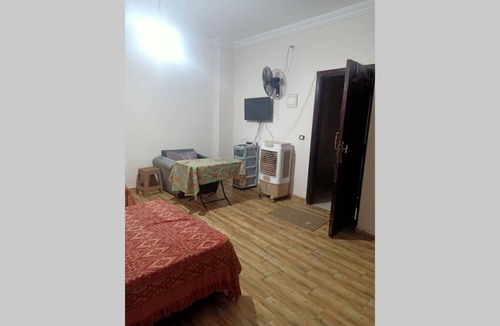 New Cairo Apartment | Luxurious studio with an area of ​​30 meters on the roof of the villa on the third floor with the privacy of the roof for the tenant with a charming view of the gardens in the best place in the Fifth Settlement, steps away from the best malls, cafes
