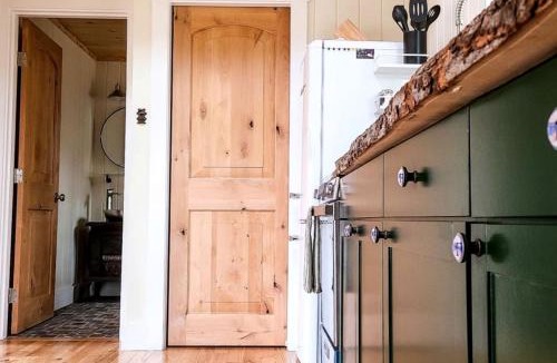 Springvale House | Luxurious Tree House with Hot Tub and Firepit, Perched over Littlefield Pond, Perfect for a Relaxing Weekend Getaway near Portland, Maine
