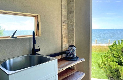 Remsenburg Condo | Luxurious Waterfront Retreat: Unwind in Hamptons Paradise
