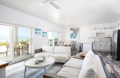 Sandy Point Villa | Luxury Beach House Villa with beachfront access & infinity pool in North Caicos!