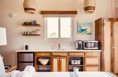 Placencia Resort | Luxury Beachfront Cabana with swim up pool bar