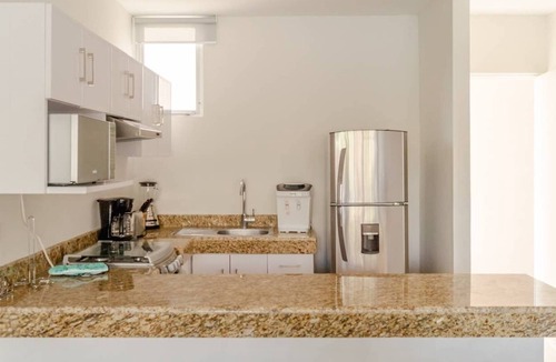 Merida Condo | Luxury Condo, 200Mbps Fiber optic, Progreso East, steps from the beach