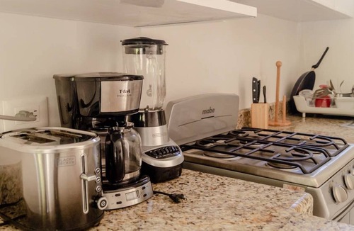 Merida Condo | Luxury Condo, 200Mbps Fiber optic, Progreso East, steps from the beach